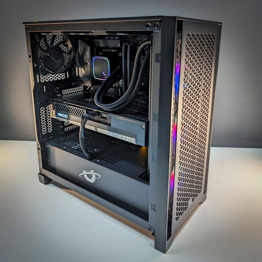 Interior of the Ballista gaming PC showing neat cable routing, liquid cooling, graphics card installation and clean component layout.