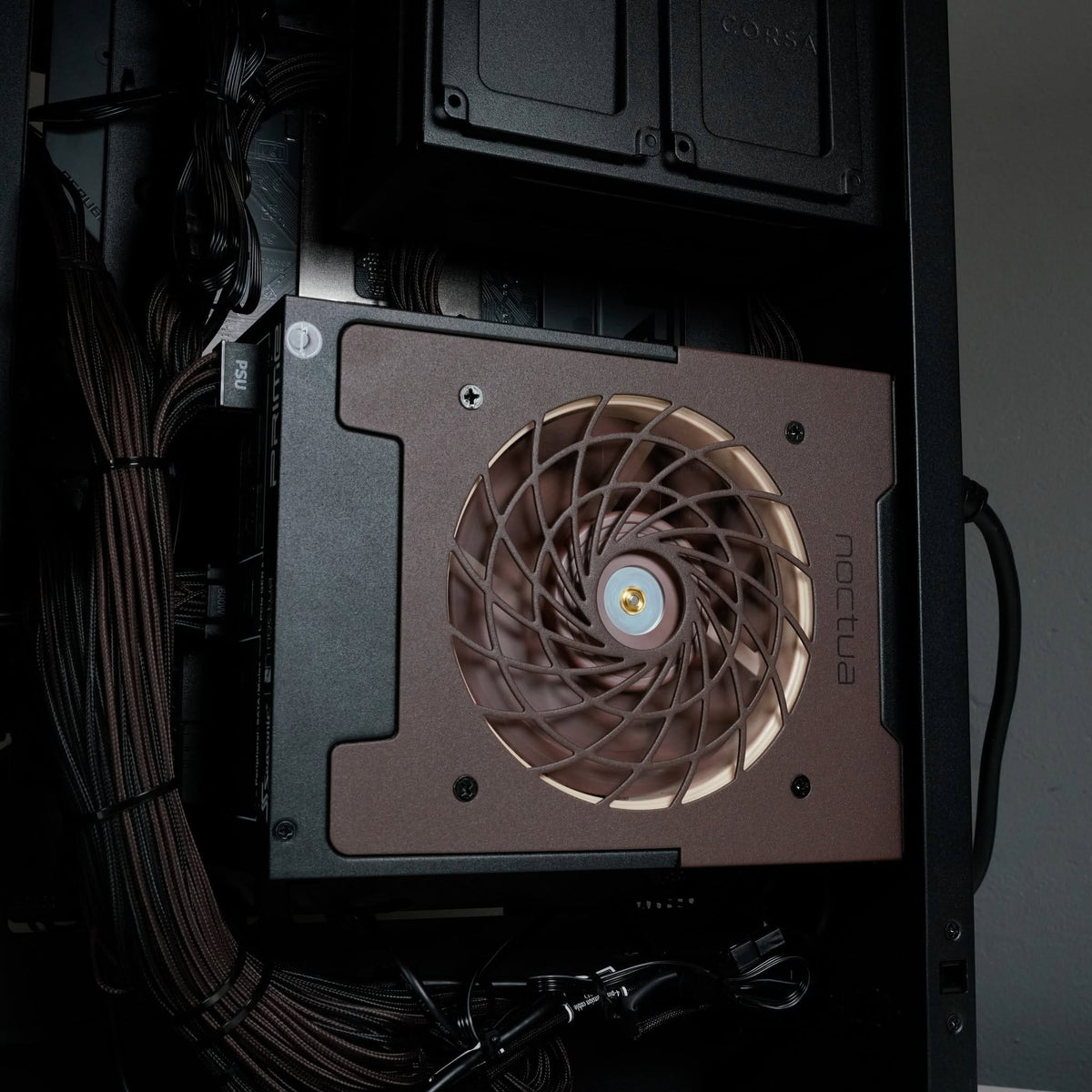 Close up of the Ballista gaming PC power supply and cable management, showing the clean internal finish of the system.