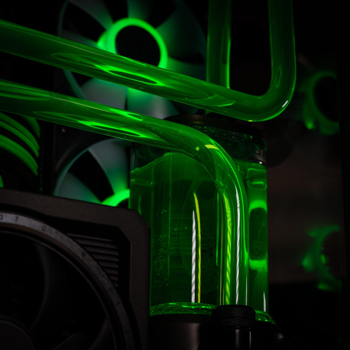 CPU water block and hardline tubing inside a high end custom gaming PC