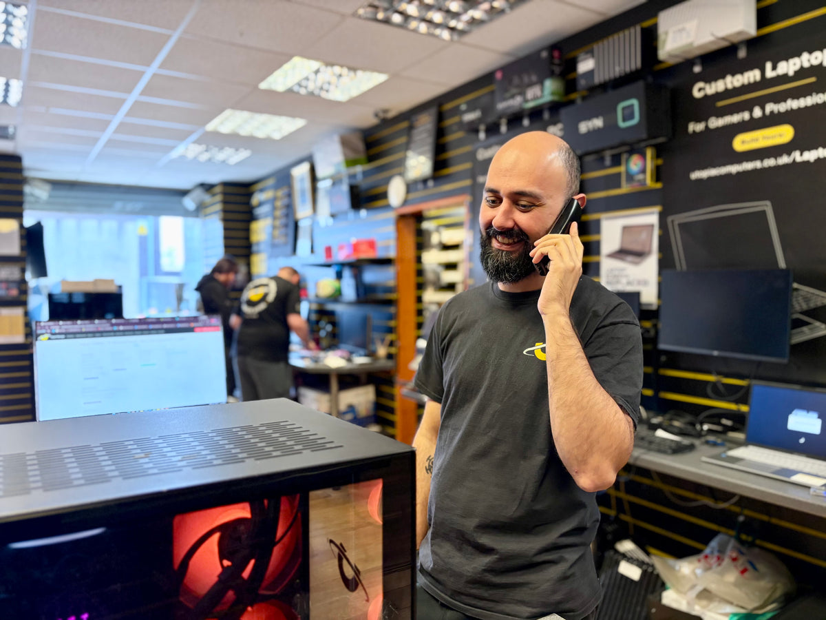 A Utopia technician building a custom water cooled PC in the Kilmarnock workshop