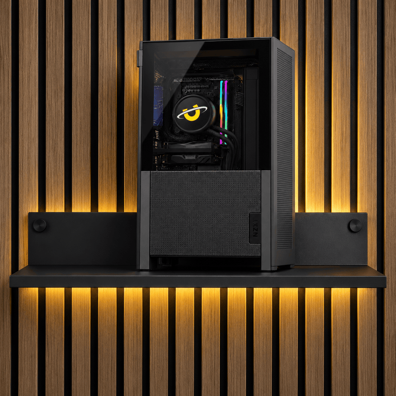 Pandora compact gaming PC displayed on a wall shelf with warm backlighting